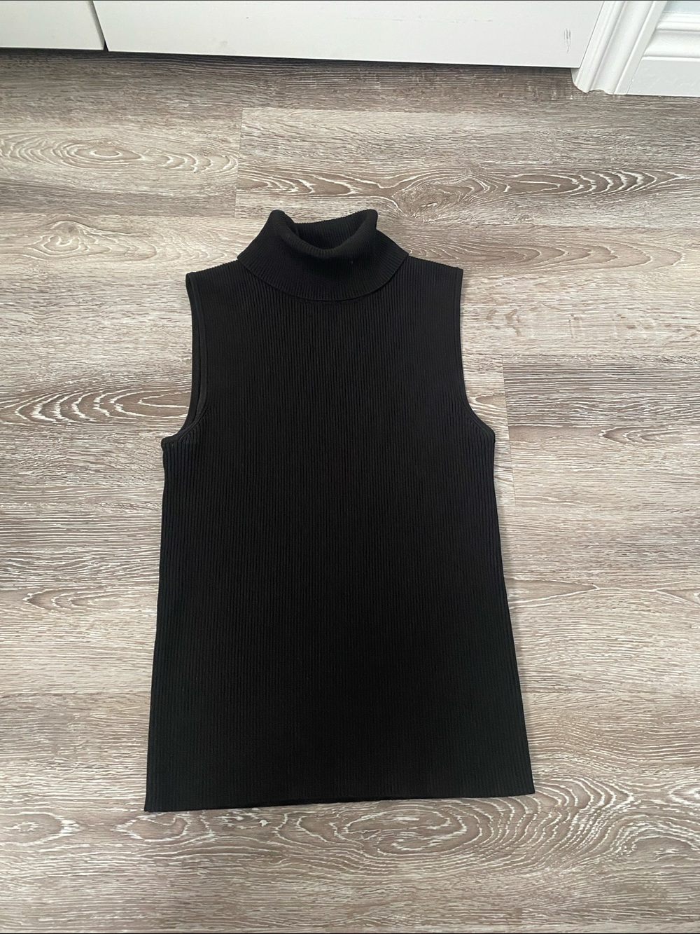 Sleeveless Black Ribbed Turtleneck Top